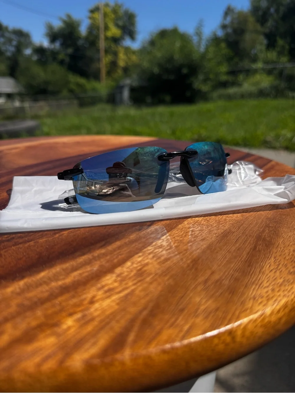 Revo Descend N RE 4059 Polarized Rimless Wrap Sunglasses Black Frame Blue Lens